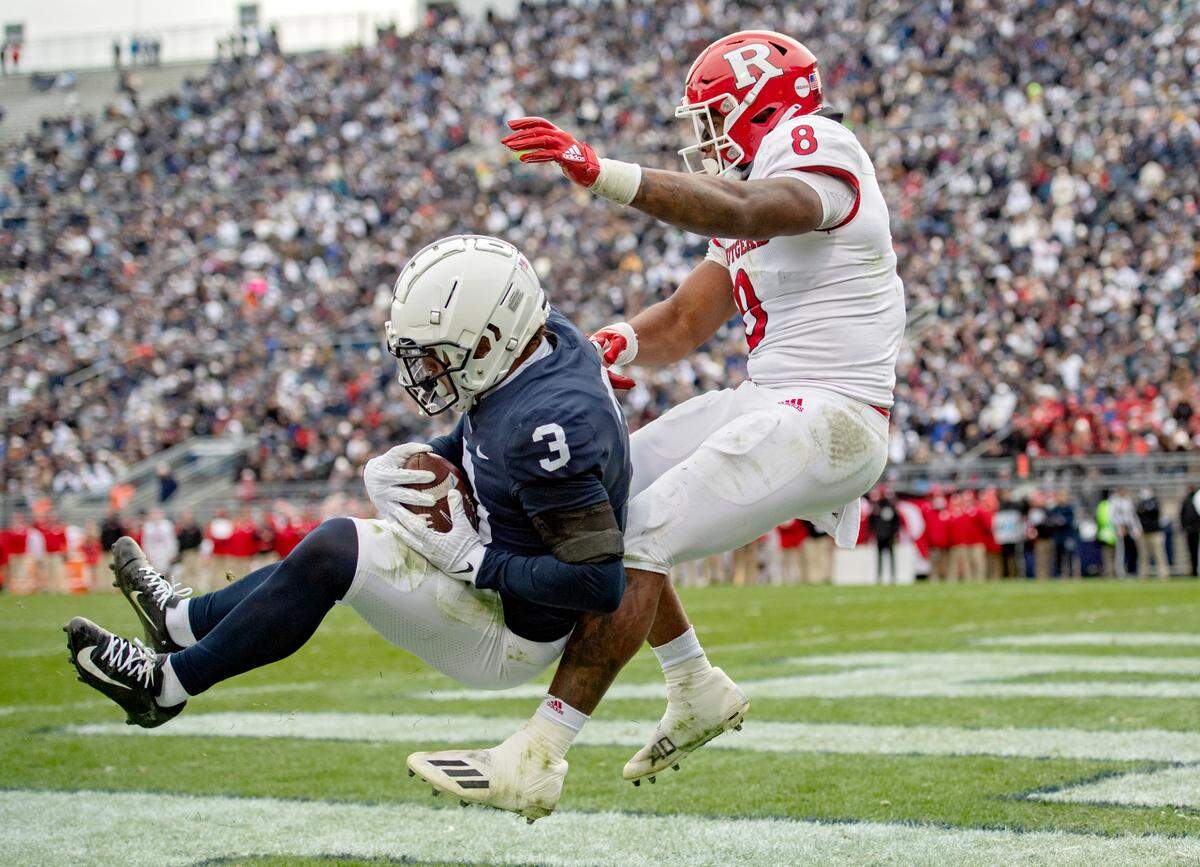 Penn State wide receiver Parker Washington makes a catch ahead of Rutgers’ Tyshon Fogg for a touchdown during the game against Rutgers on Saturday, Nov. 20, 2021.