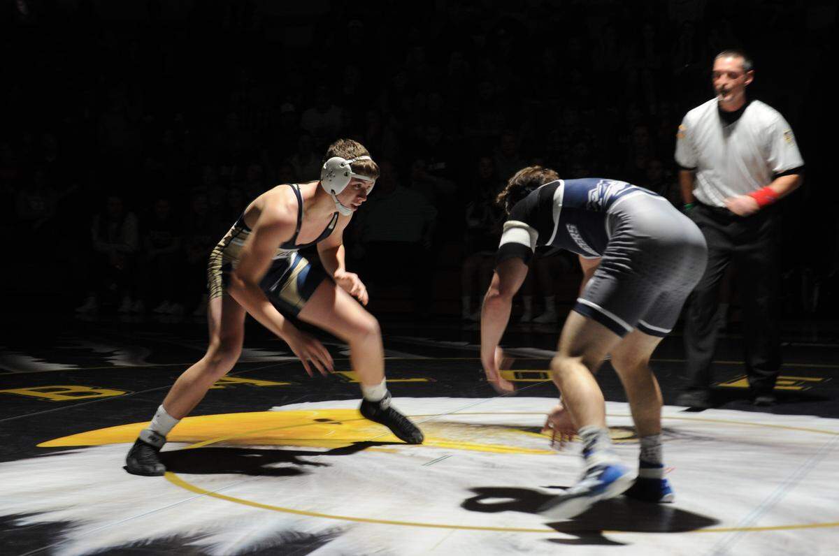 Bald Eagle Area’s Noah Foltz, left, made his debut on the wins, fastest falls and major decisions list this week. The Eagles’ junior leads his team with 12 wins, which is tied for second in the county.