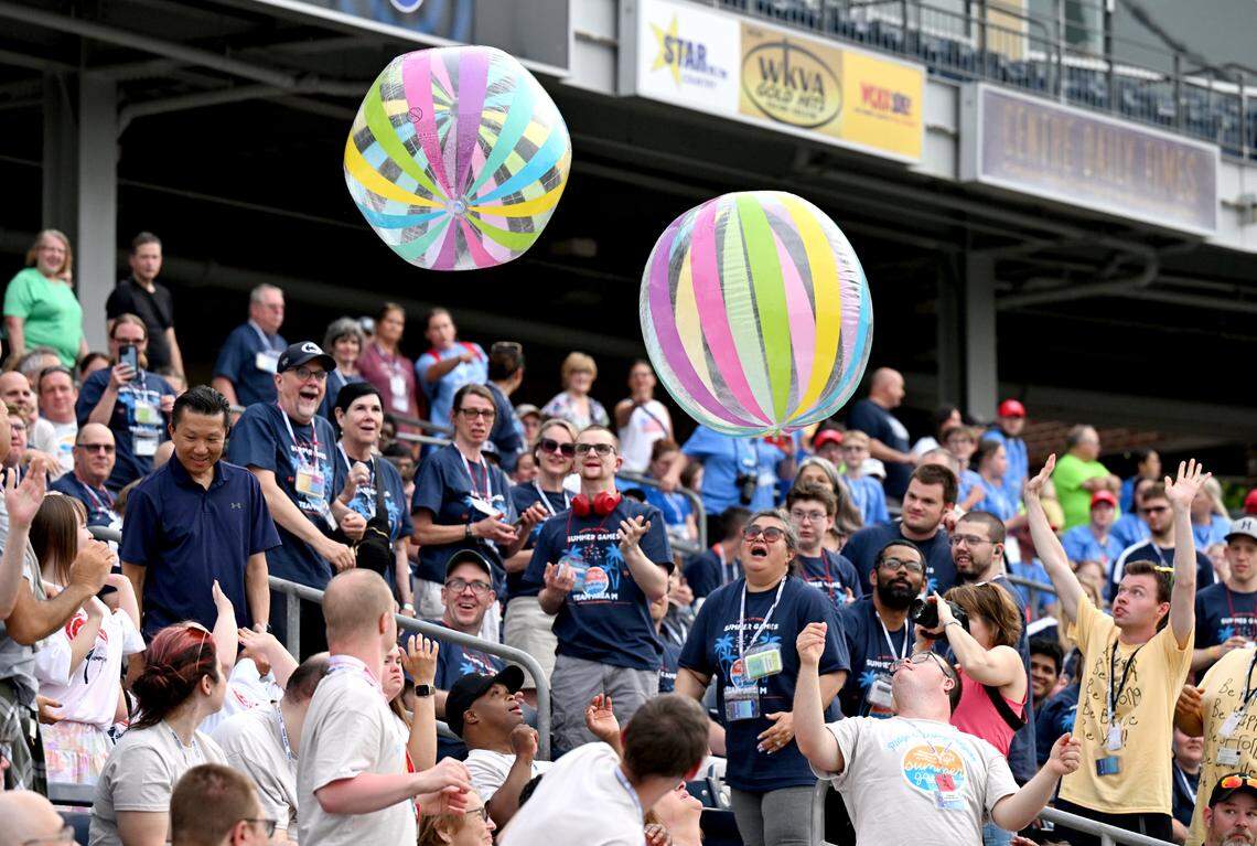 Athletes and coaches play a game trying to keep a beach ball out of their section during the opening ceremony of the Special Olympics PA Summer Games on Thursday, June 5, 2025 at Medlar Field.