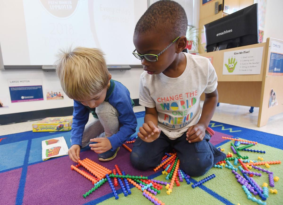 Conary McClain, left, and Eli James play with toys for the Preschooler-Approved Toy Test Friday, Sept. 28, 2018 at The Goddard School in State College.