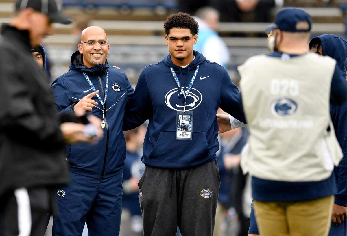 Penn State football coach James Franklin poses with recruits including Drew Shelton for a photo before the game against Illinois on Saturday, Oct. 23, 2021.