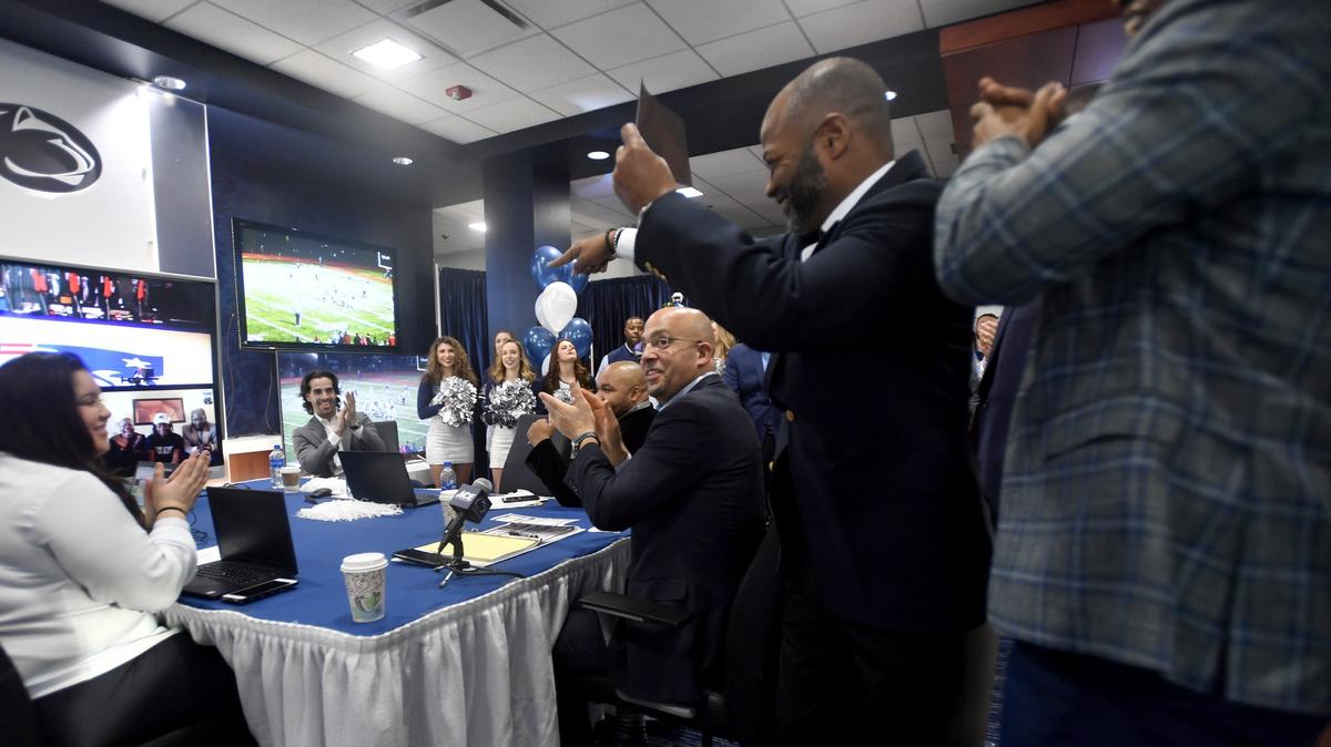 Penn State defensive recruiting coordinator Terry Smith cheers during the early signing period.