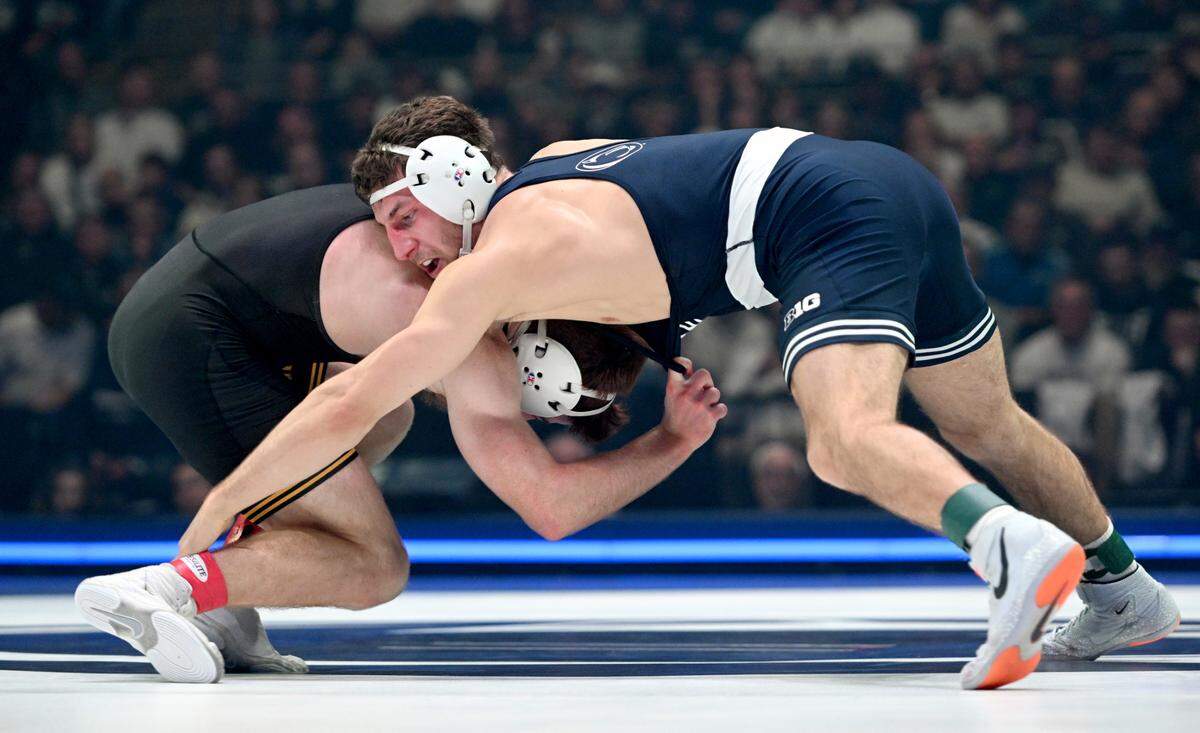 Penn State’s Mitchell Mesenbrink wrestles Iowa’s Mikey Caliendo in the 165-pound bout of the match on Friday, Jan. 31, 2025 at the Bryce Jordan Center. Mesenbrink won by tech fall at 6:42.