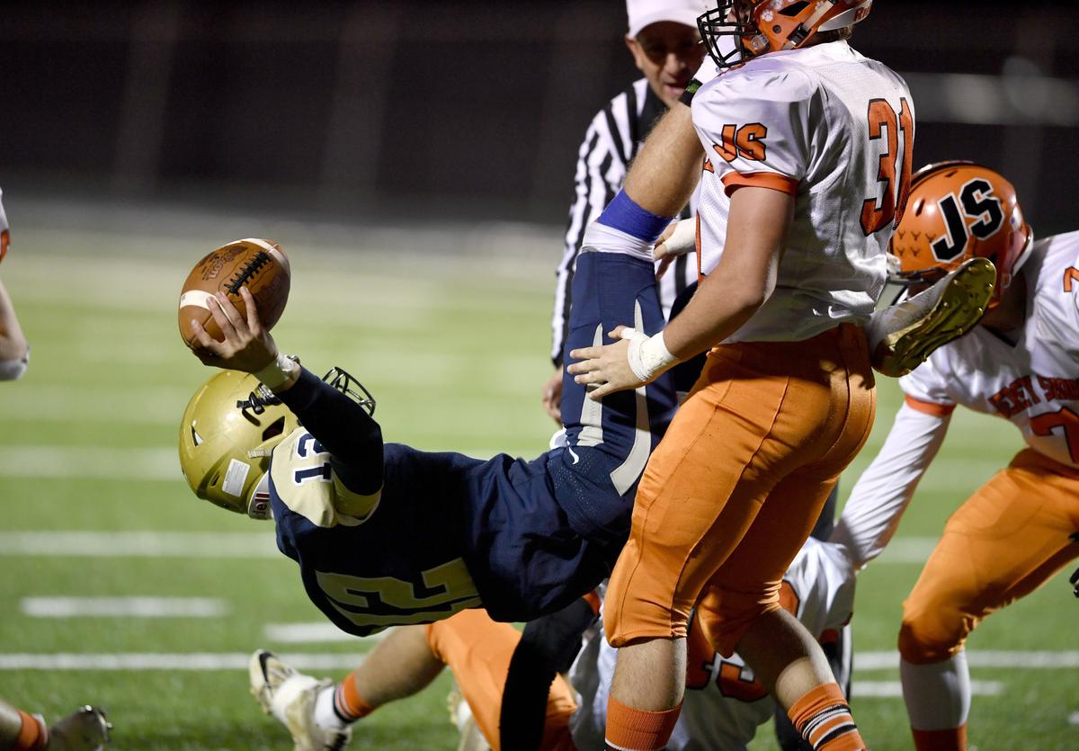 Jersey Shore’s Ryan Kershner drops Bald Eagle Area’s Jaden Jones during the game on Friday, Oct. 18, 2019.