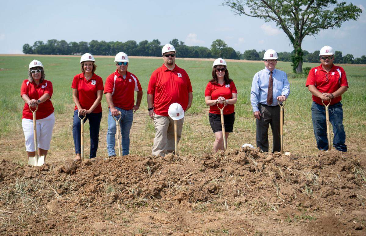 Bellefonte Area School District school board members, along with then-superintendent Tammie Burnaford and upcoming superintendent Roy Rakszawski, pose for a photo during the groundbreaking ceremony for the new elementary school on Friday, June 21, 2024.