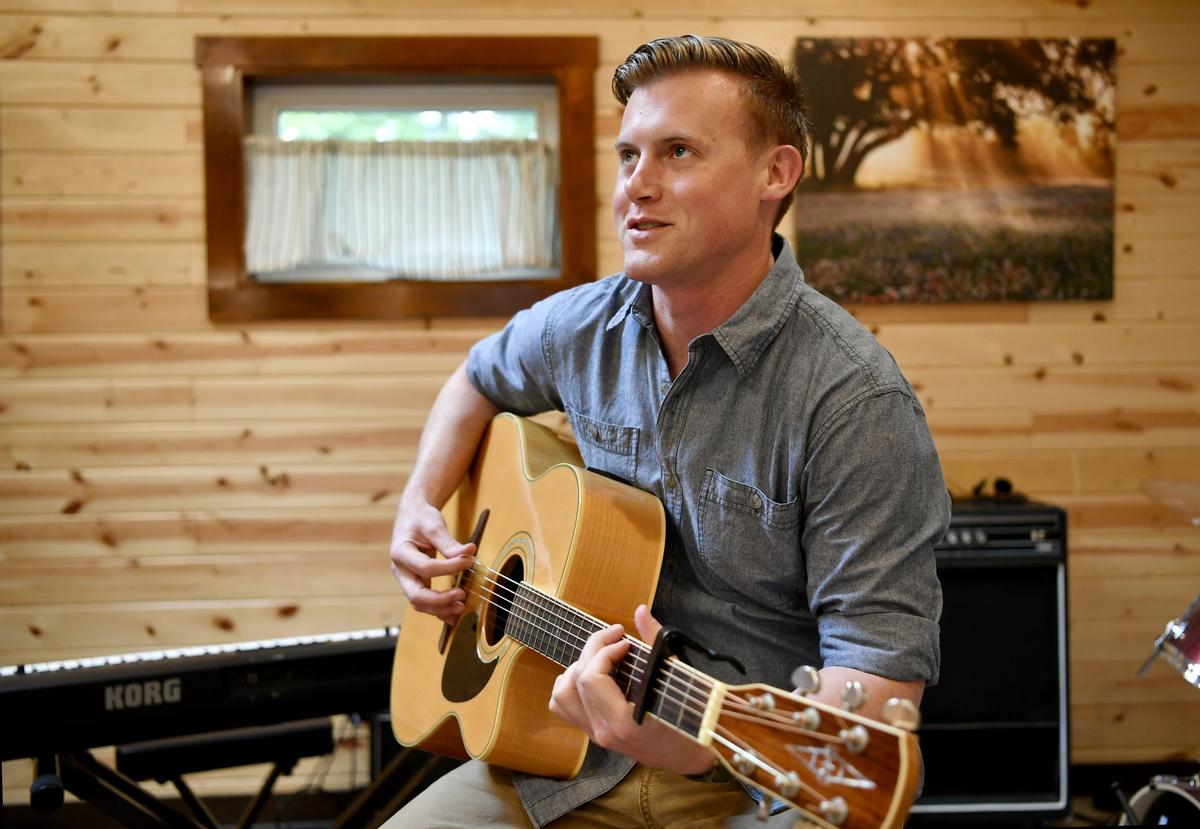 William Ryan sings his song “4 Mile Road” at Hedgerow Studio on Tuesday. Ryan won the Pennsylvania Heritage Songwriting contest with the tune.