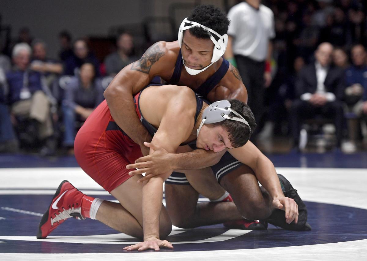 Penn State’s Mark Hall controls Penn’s Neil Antrassian in the 174 lb bout during the match on Sunday, Dec. 8, 2019. Hall won by tech fall.