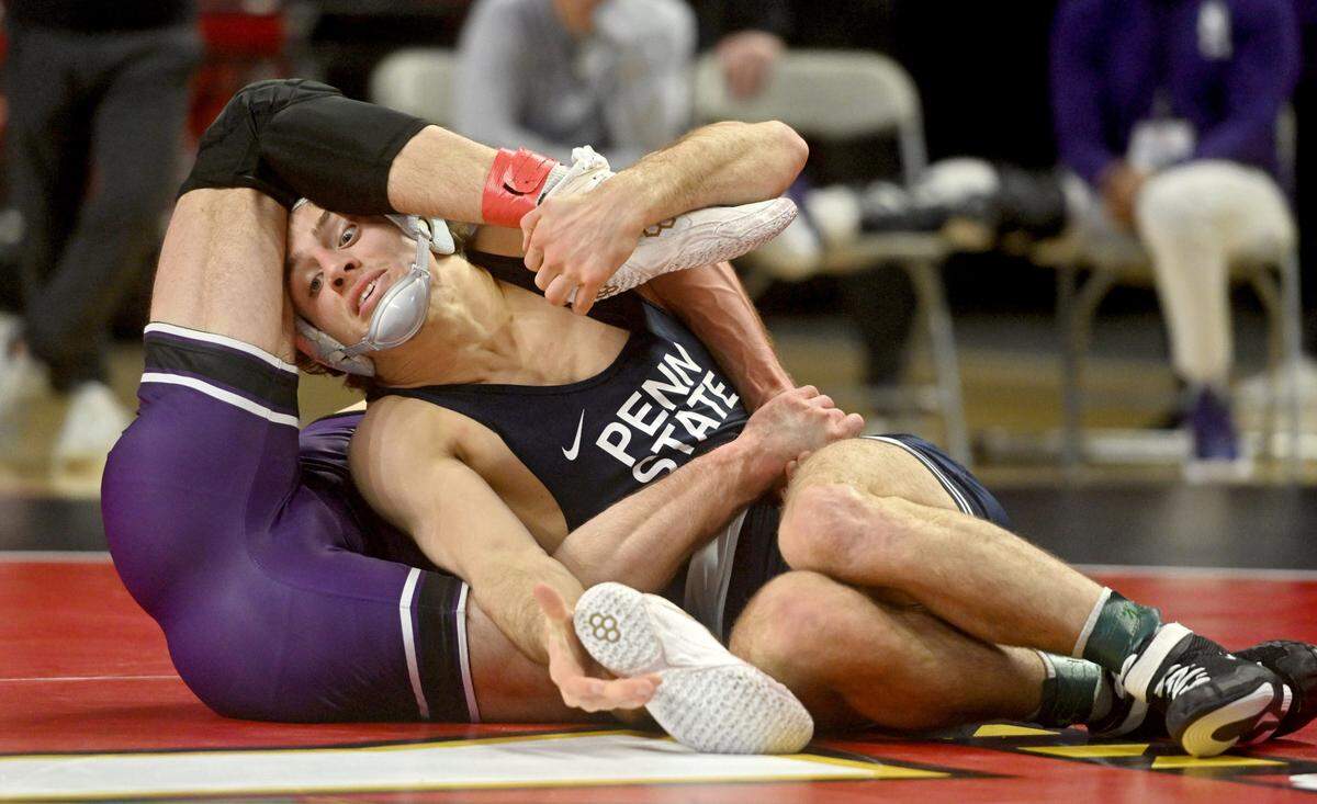 Penn State’s Levi Haines wrestles Northwestern’s Trevor Chumbley in a 157 lb quarterfinal match of the Big Ten Wresting Championships at the Xfinity Center at the University of Maryland on Saturday, March 9, 2024.