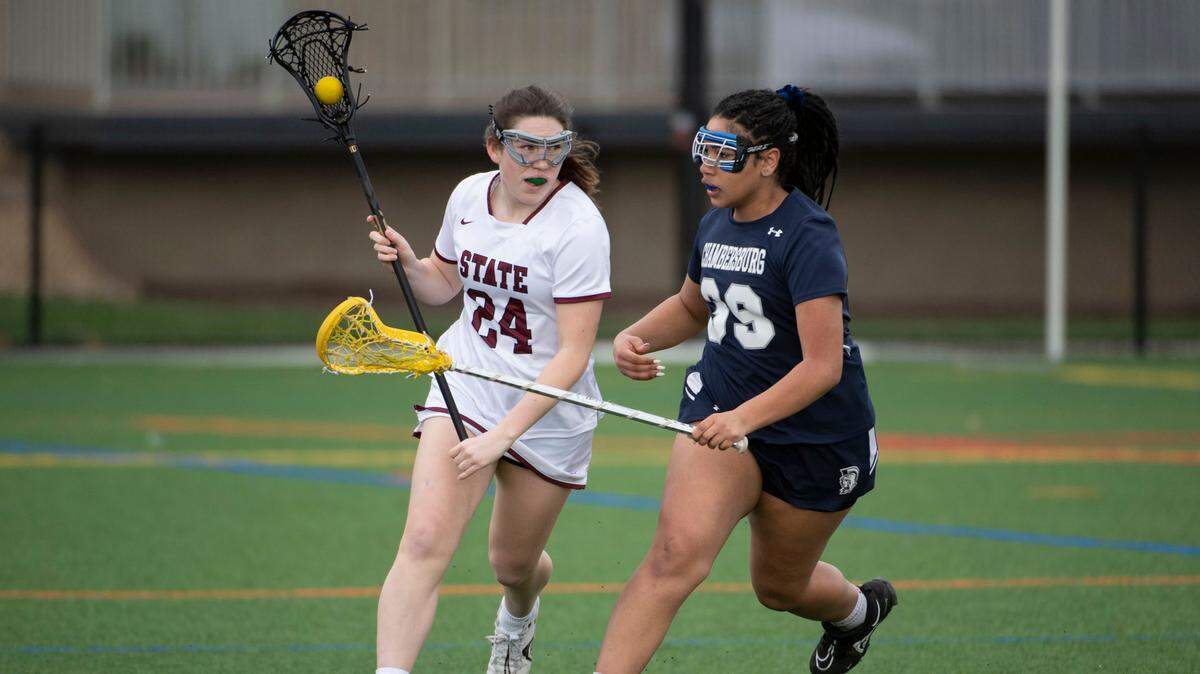 State College’s Katie Fry (24) runs to goal during a lacrosse game between State High and Chambersburg on Thursday in State College.