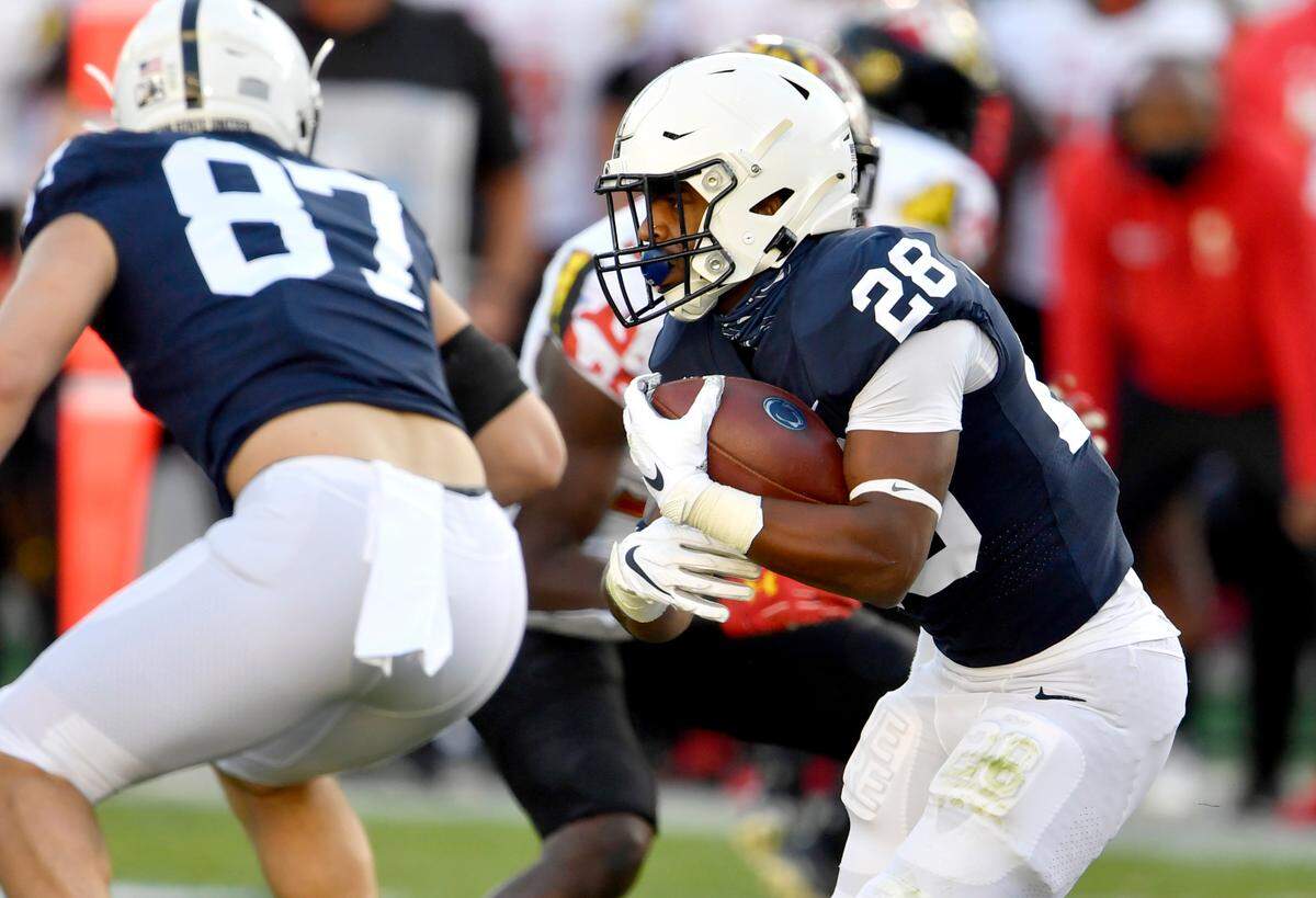 Penn State running back Devyn Ford cuts down the field with the ball during the game against Maryland on Saturday, Nov. 7, 2020 at Beaver Stadium. 