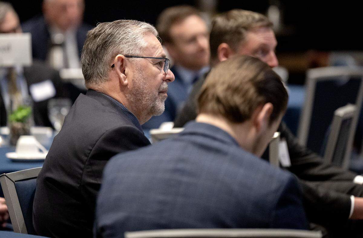 Sen. Cris Dush listens to fellow senator Wayne Langerholc during the CBICC annual Legislative Breakfast on Tuesday, April 7, 2026.  