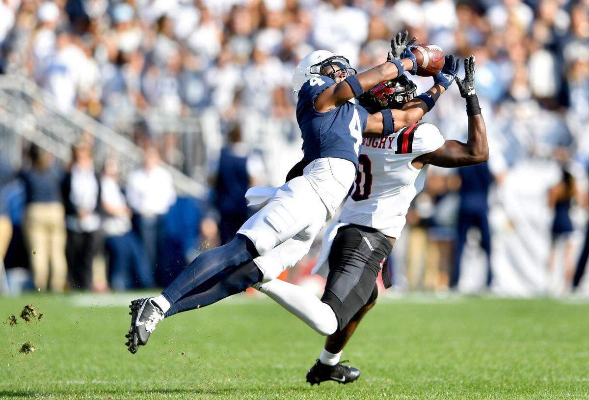 Penn State cornerback Kalen King breaks up a pass intended for Ball State wide receiver Jalen McGaughy during the game on Saturday, Sept. 11, 2021.