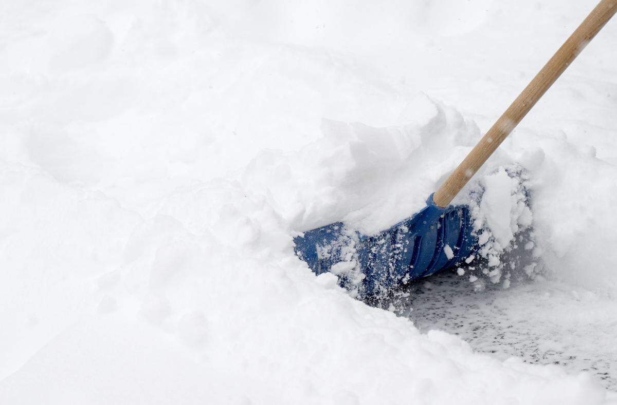 Shoveling about 7 inches of snow in College Township before noon on Sunday, Jan. 25, 2026.  