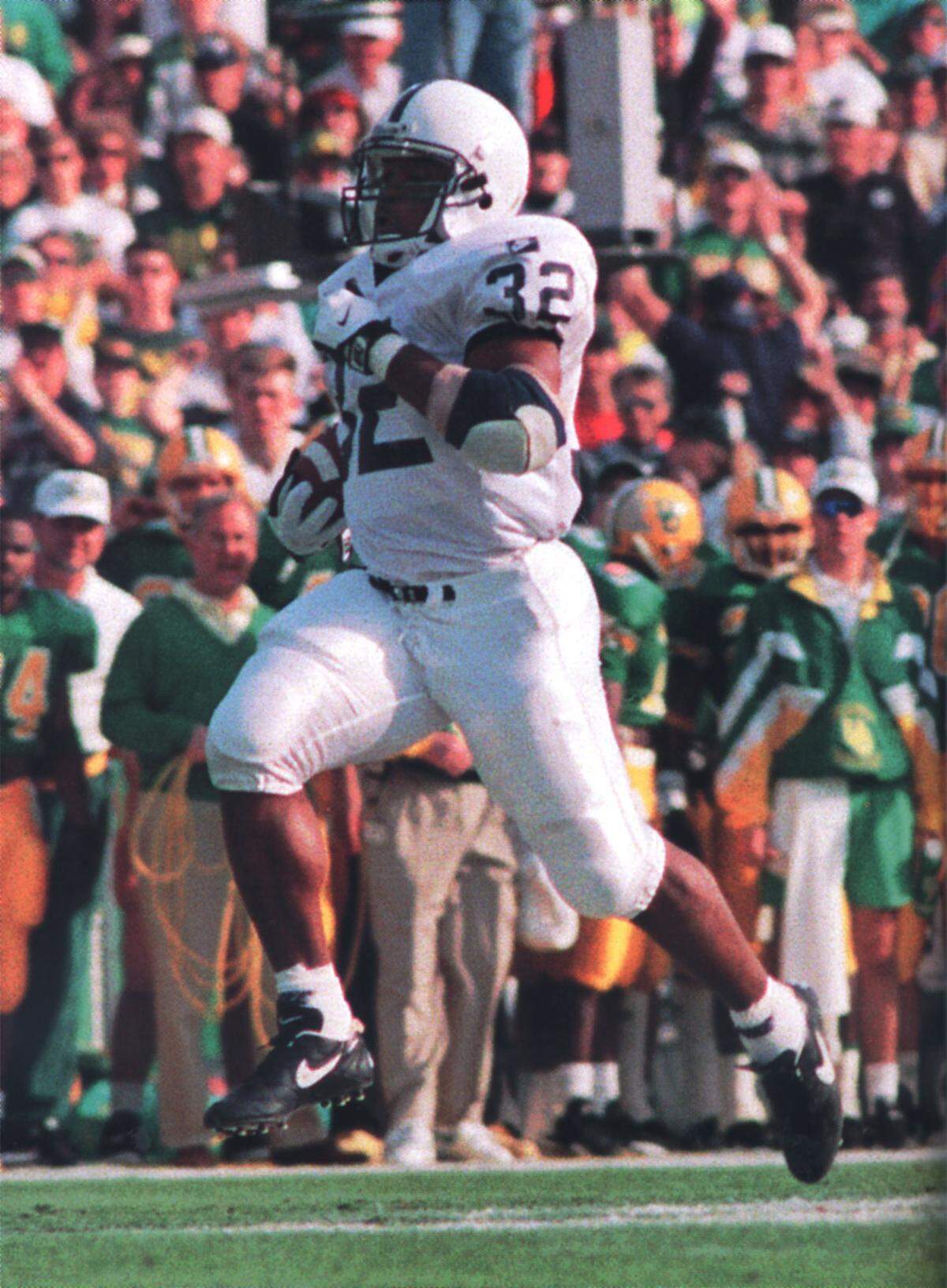 Ki-Jana Carter sprints toward the Rose Bowl end zone after breaking loose on a 83-yard touchdown run on his first carry of thegame. Carter finished with  158 yards and three touchdowns.