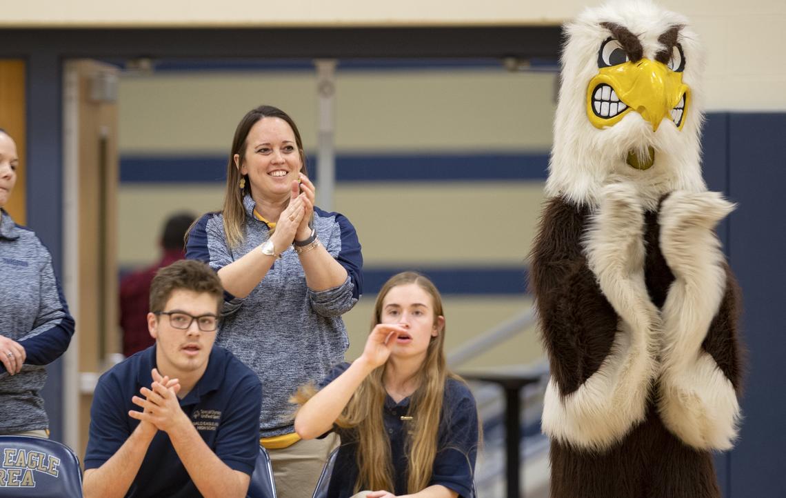 Bald Eagle Area unified bocce coach Erica Milliron cheers for her players Thursday during the match against State College.