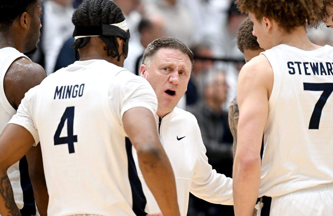 Penn State men's basketball coach Mike Rhoades talks to his players during the game against Wisconsin in Rec Hall on Thursday, Jan. 22, 2026. 