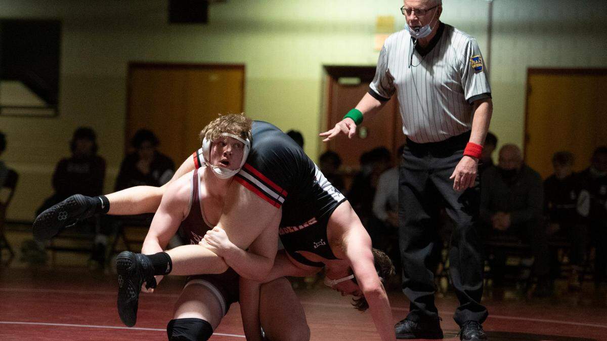 State College’s Nick Pavlechko wrestles Williamsport’s Charlie Lundy during a PIAA wrestling bout between State High and Williamsport at State High gym on Jan. 31.