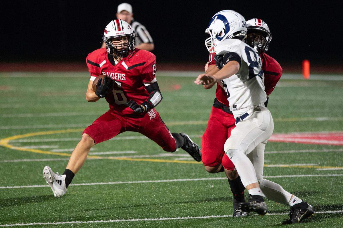Bellefonte wide receiver Ashten Howell runs the ball up field during the football game against Penns Valley at Bellefonte Area High School on Friday, Sept. 20, 2024. The Red Raiders won 34-13.