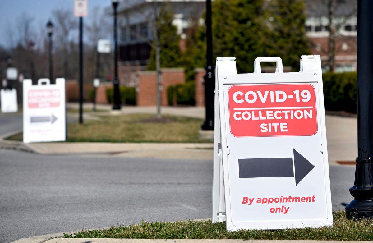 Signs directing patients to the drive through COVID-19 testing at Mount Nittany Health’s Blue Course Drive location on Thursday, March 26, 2020.