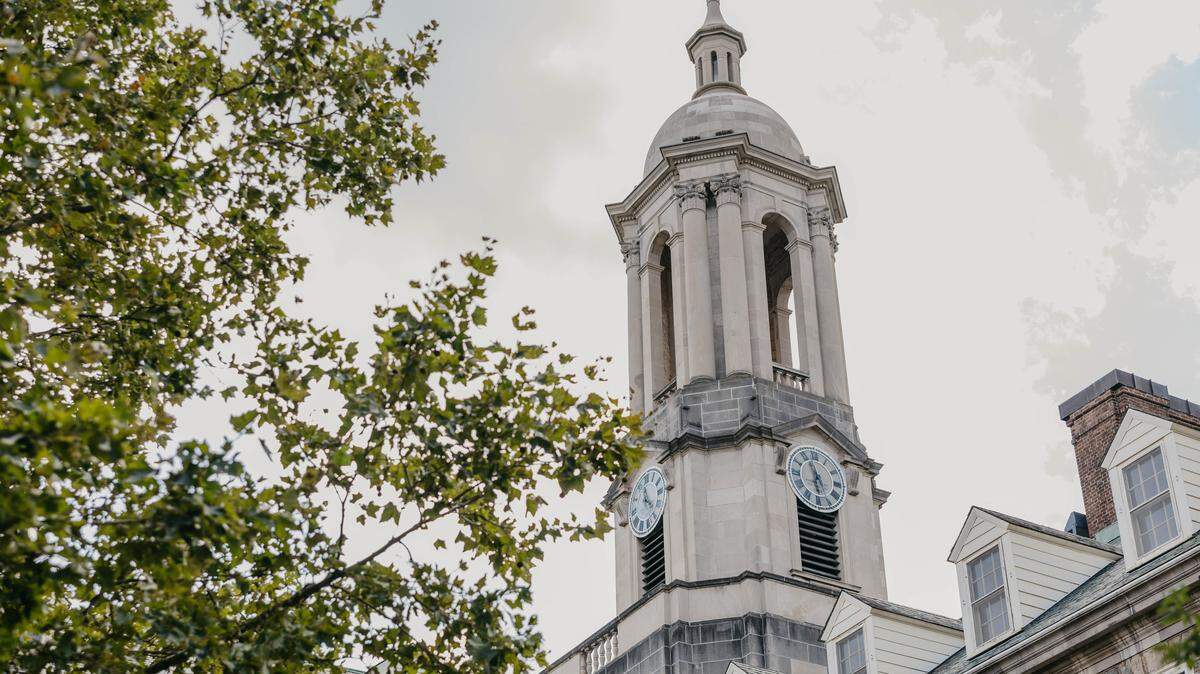 The bell tower of Old Main on Penn State’s campus