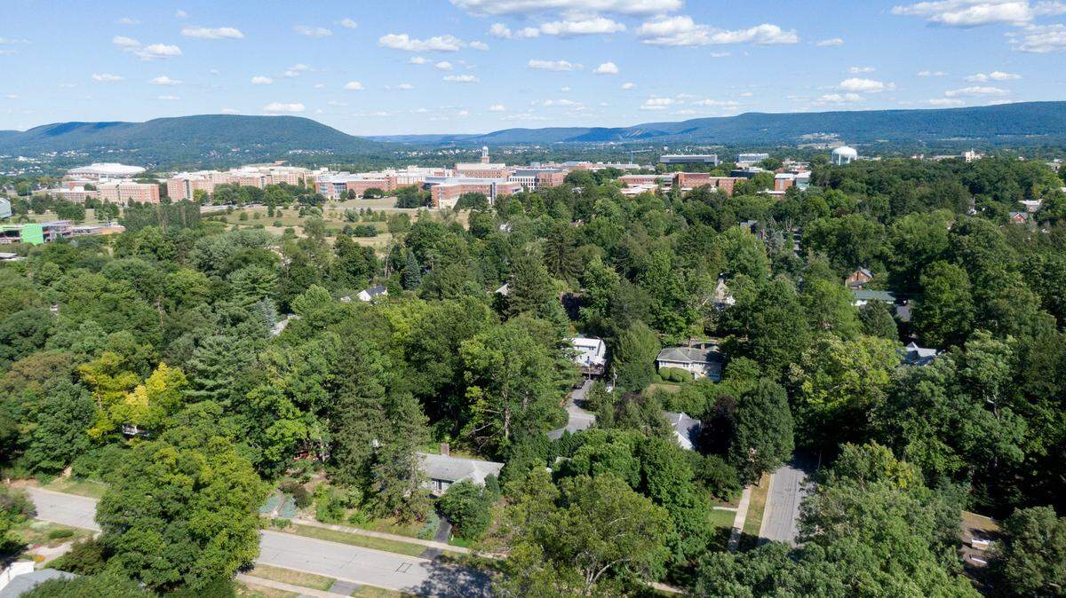 The Penn State campus is seen past the College Heights neighborhood on Friday, Aug. 12, 2022.