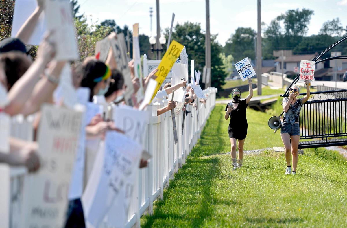 Mary Betts and Meghan Zelensky lead a chant during a Black Lives Matter rally at the Cold Stream Dam in Philipsburg along Route 322 on Sunday, June 7, 2020.