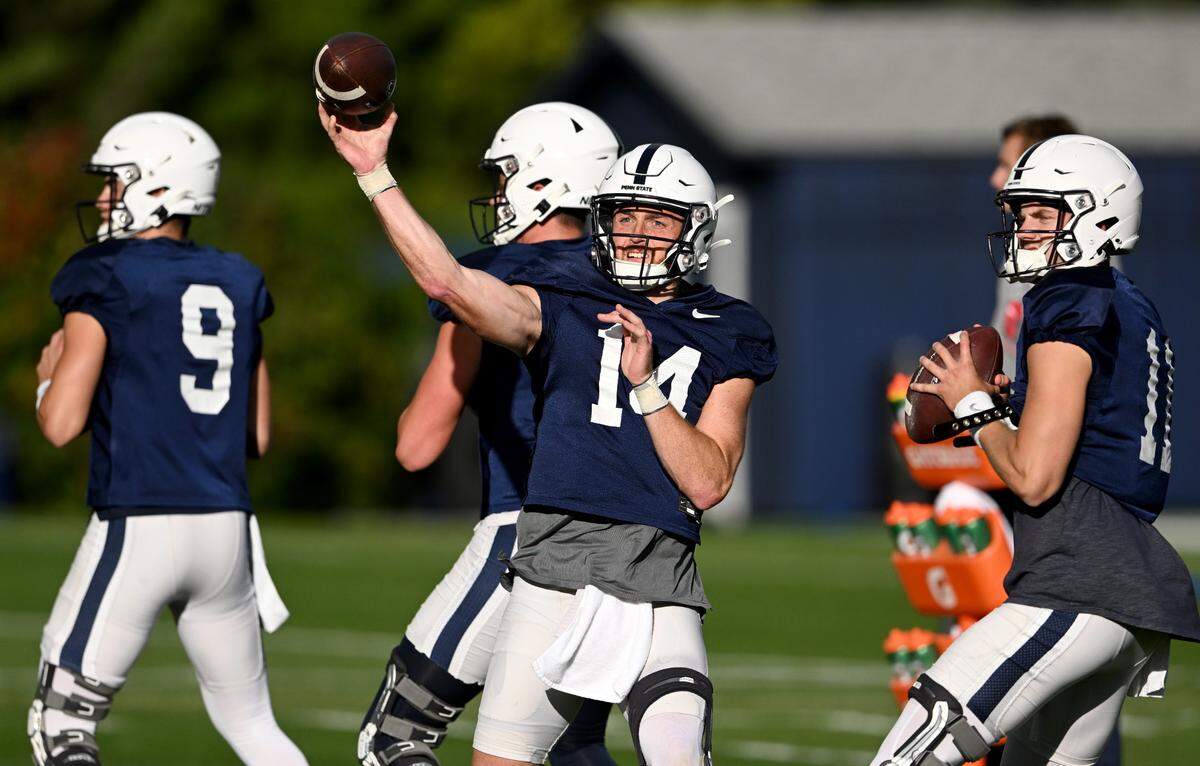 Penn State quarterback Sean Clifford throws a pass during practice on Wednesday, Sept. 28, 2022.