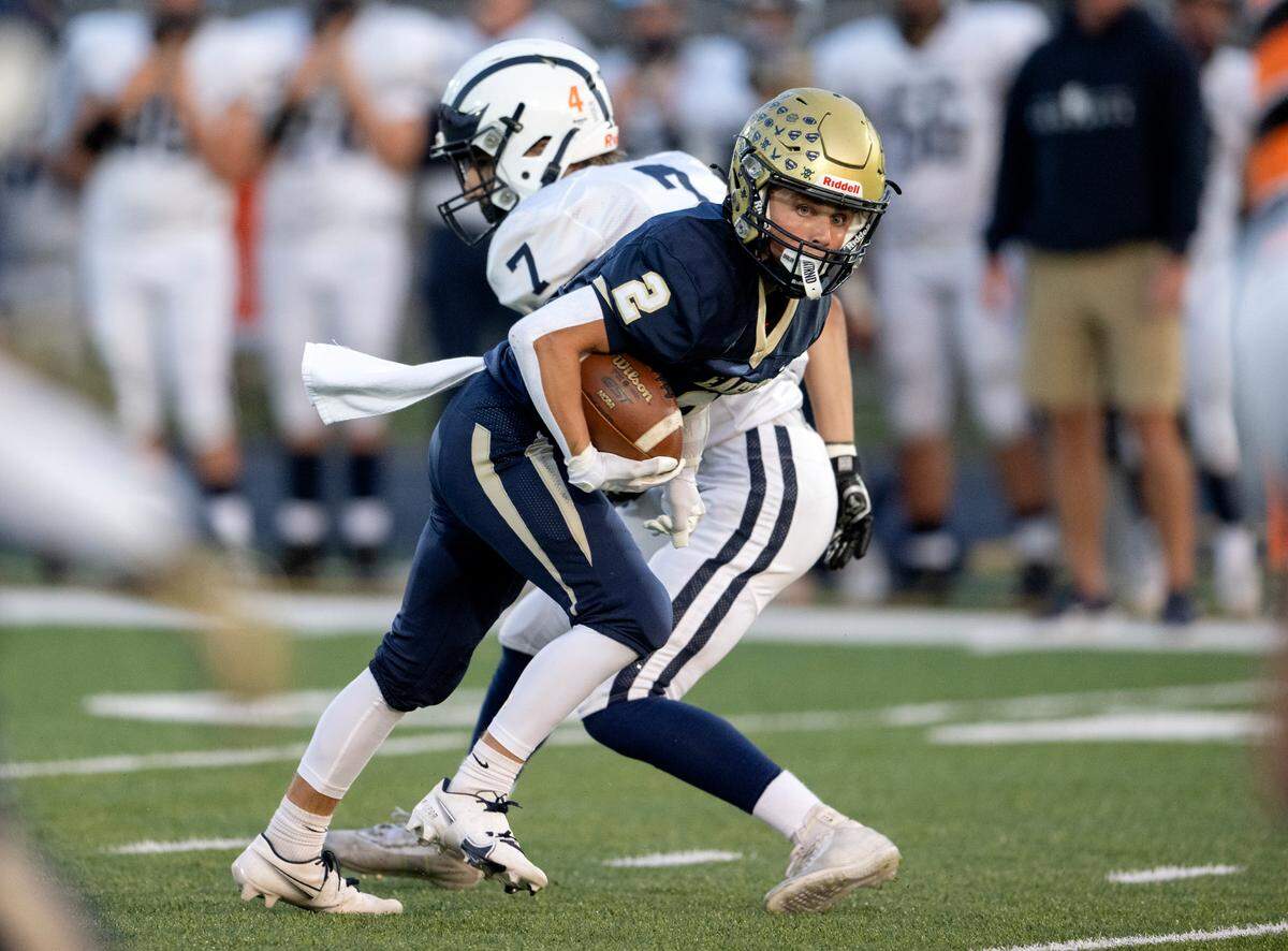 Bald Eagle Area’s Kahale Burns cuts around Philipsburg-Osceola’s Dayton Barger during the game on Friday, Sept. 22, 2023.