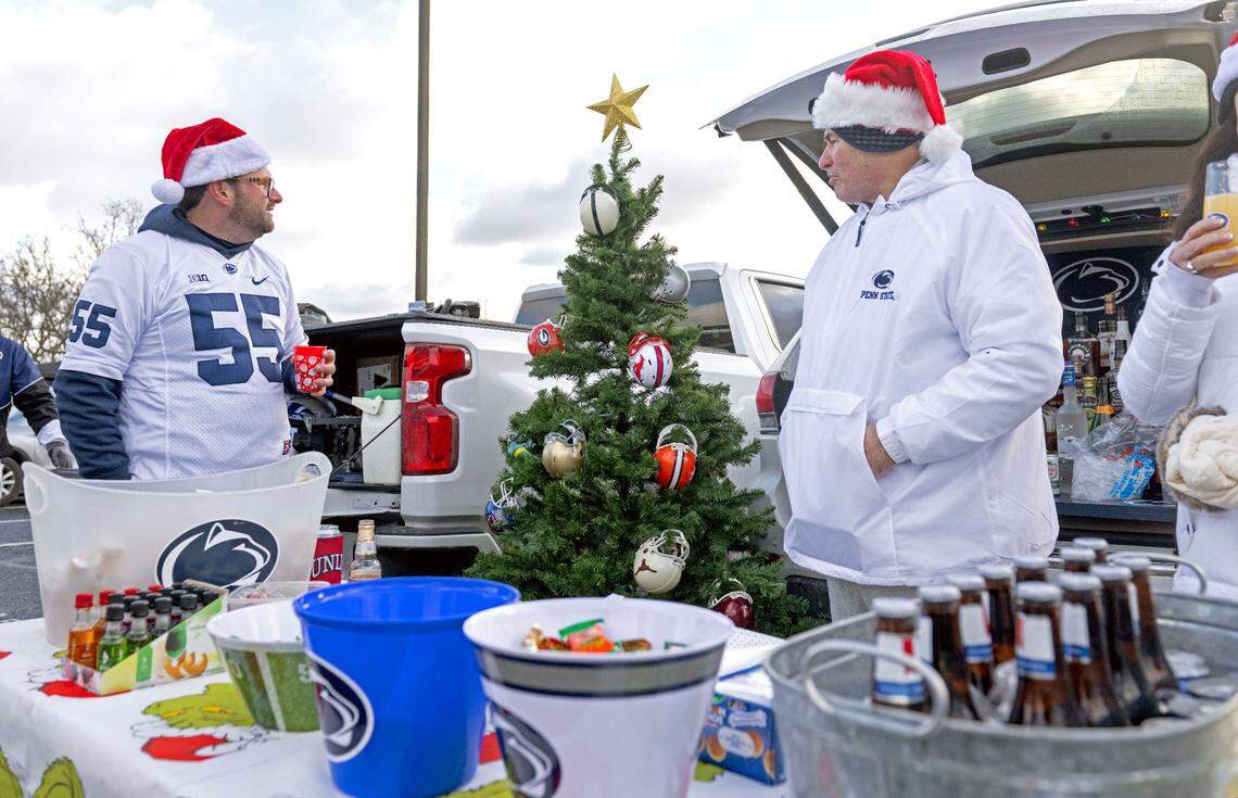The Patterson tailgate outside of Beaver Stadium featured a College Football Playoff Christmas tree with the helmets all 12 schools, with Penn State’s on top.