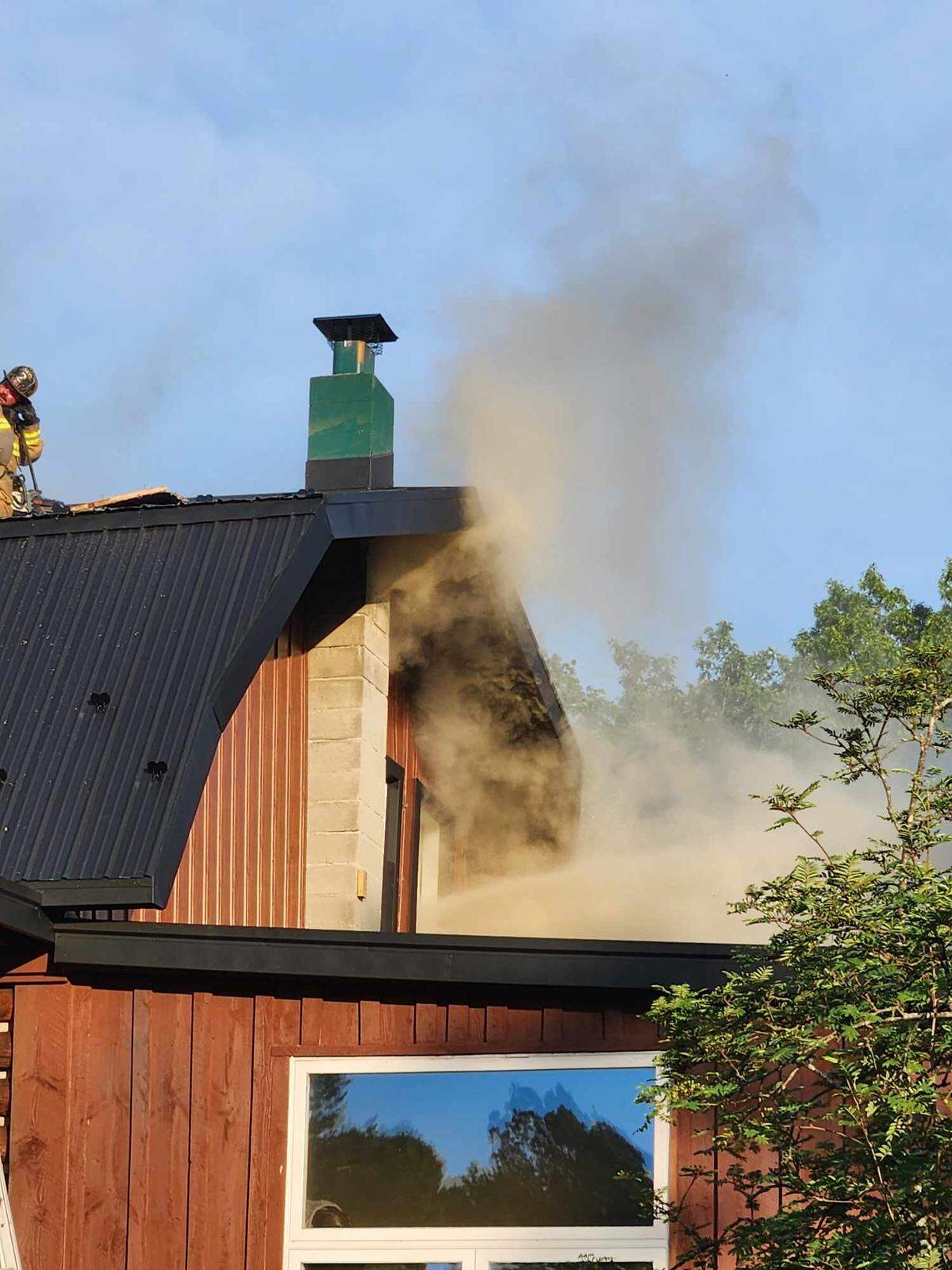 Firefighters respond to a fire in the 800 block of Uzzell Road on Monday, June 24, in Snow Shoe.