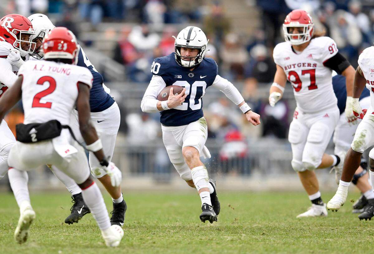 Penn State quarterback Mason Stahl cuts down the field with the ball during the game against Rutgers on Saturday, Nov. 20, 2021.