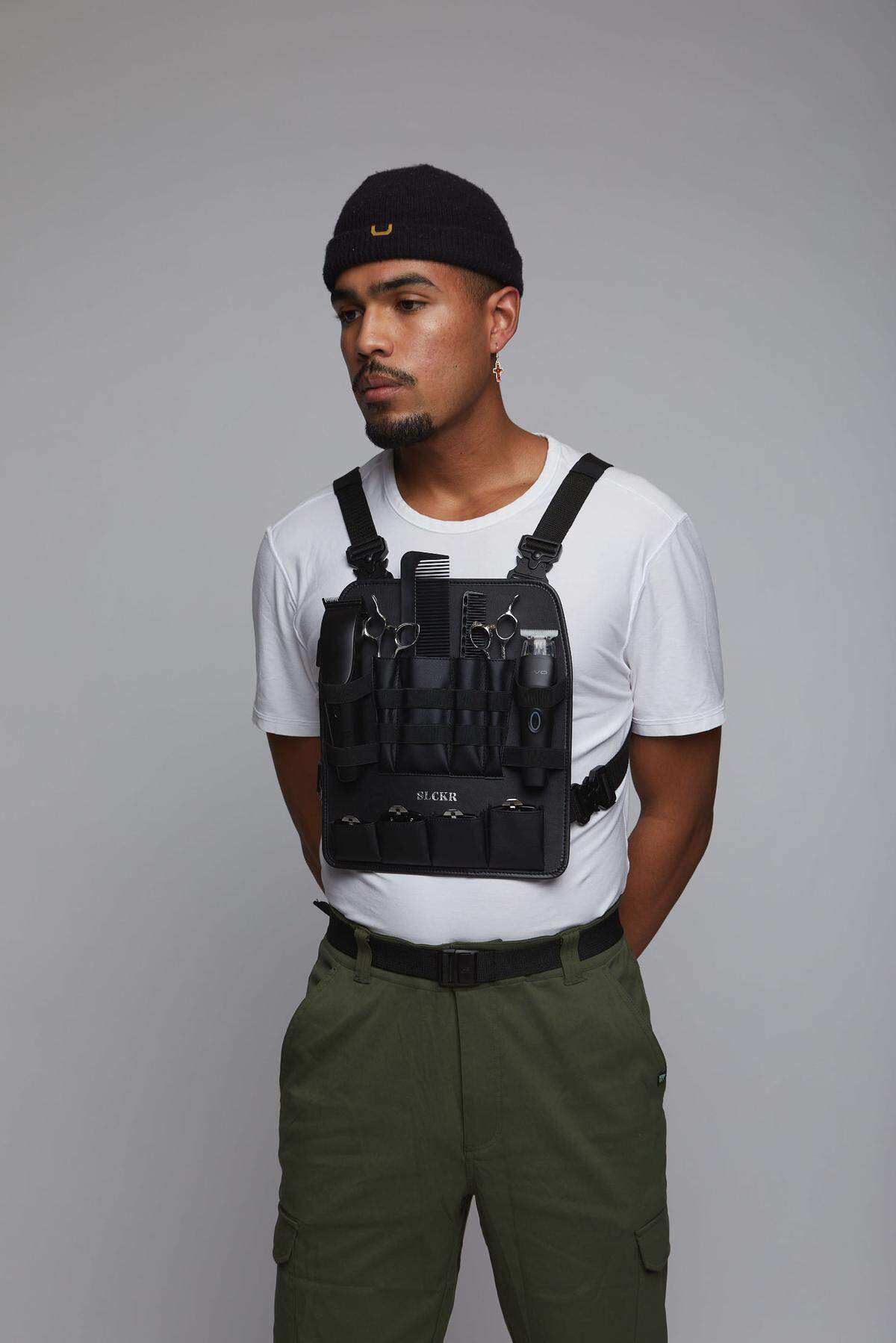 The Rig is a chest rig that stores all the tools a barber most frequently uses throughout the course of a haircut.