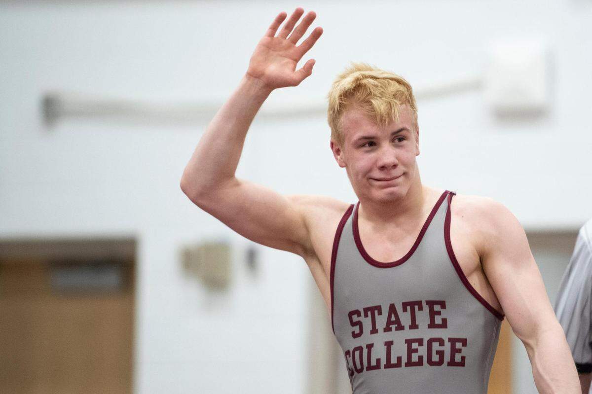 Pierson Manville raises his hand after winning the PIAA District 6 AAA Championships at Altoona Area High School on Saturday, Feb. 26, 2022 in Altoona, Pa.