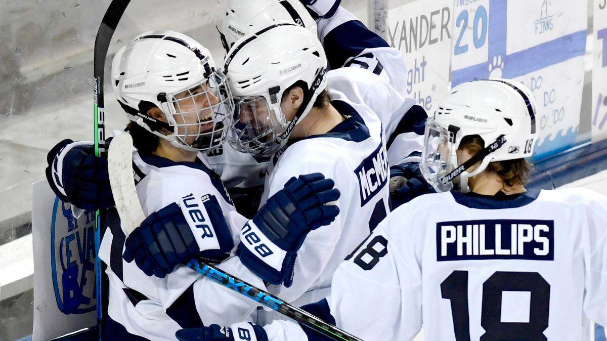 Penn State hockey celebrates the first goal in the game against Michigan on Thursday, Dec. 3, 2020 at Pegula Ice Arena.