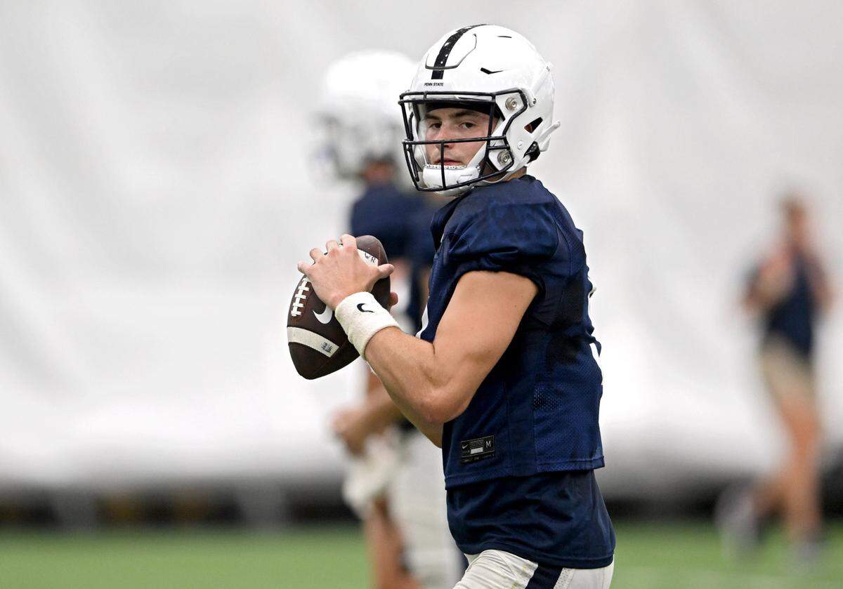 Penn State quarterback Beau Pribula makes a pass during practice on Sunday, Aug. 6, 2023.