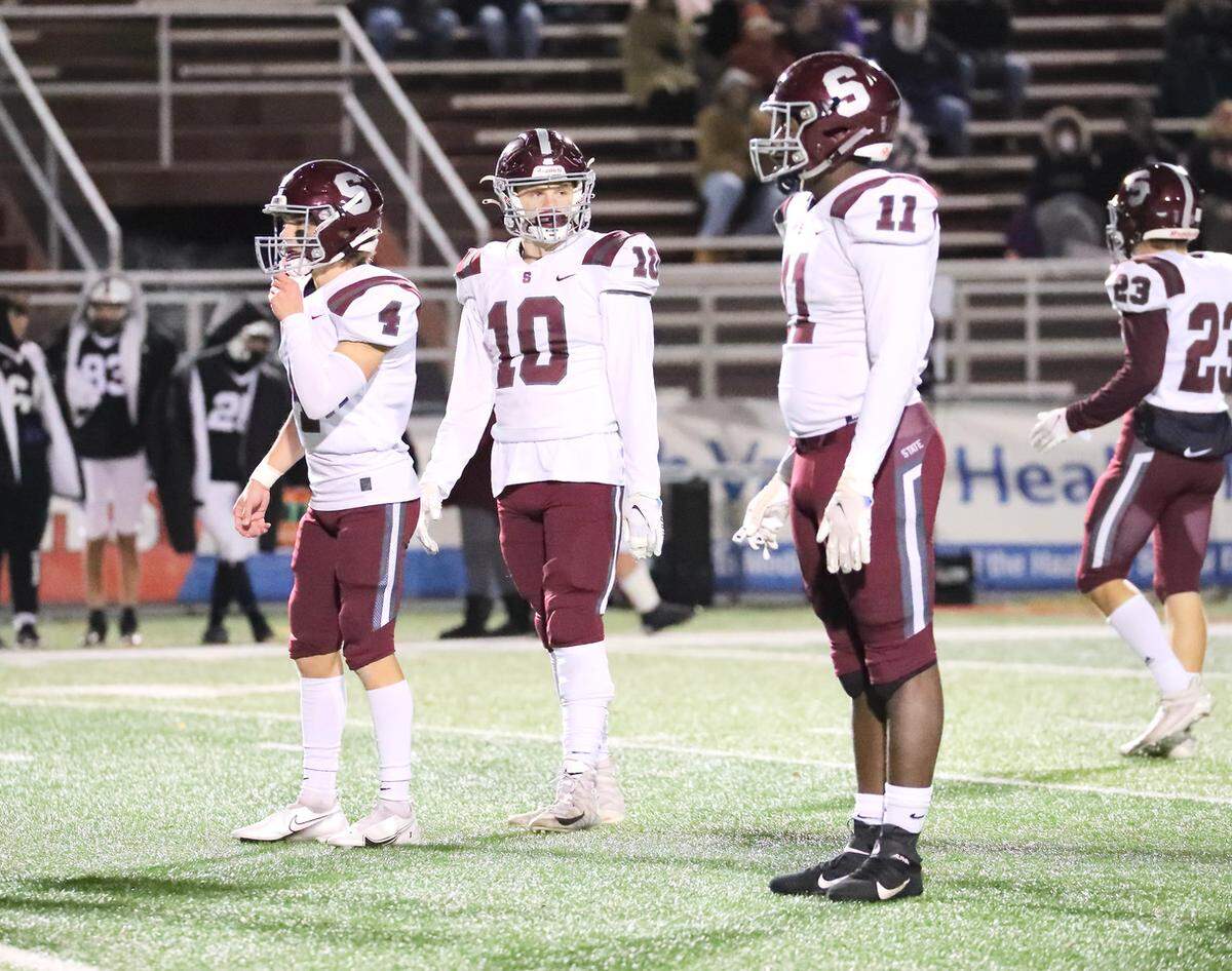 State College’s Owen Barr (4), Jack Roeshot (10) and JW Scott (11) line up against Delaware Valley on Friday, Nov. 19, 2021 in the opening round of the PIAA 6A championships at Hazleton High School.