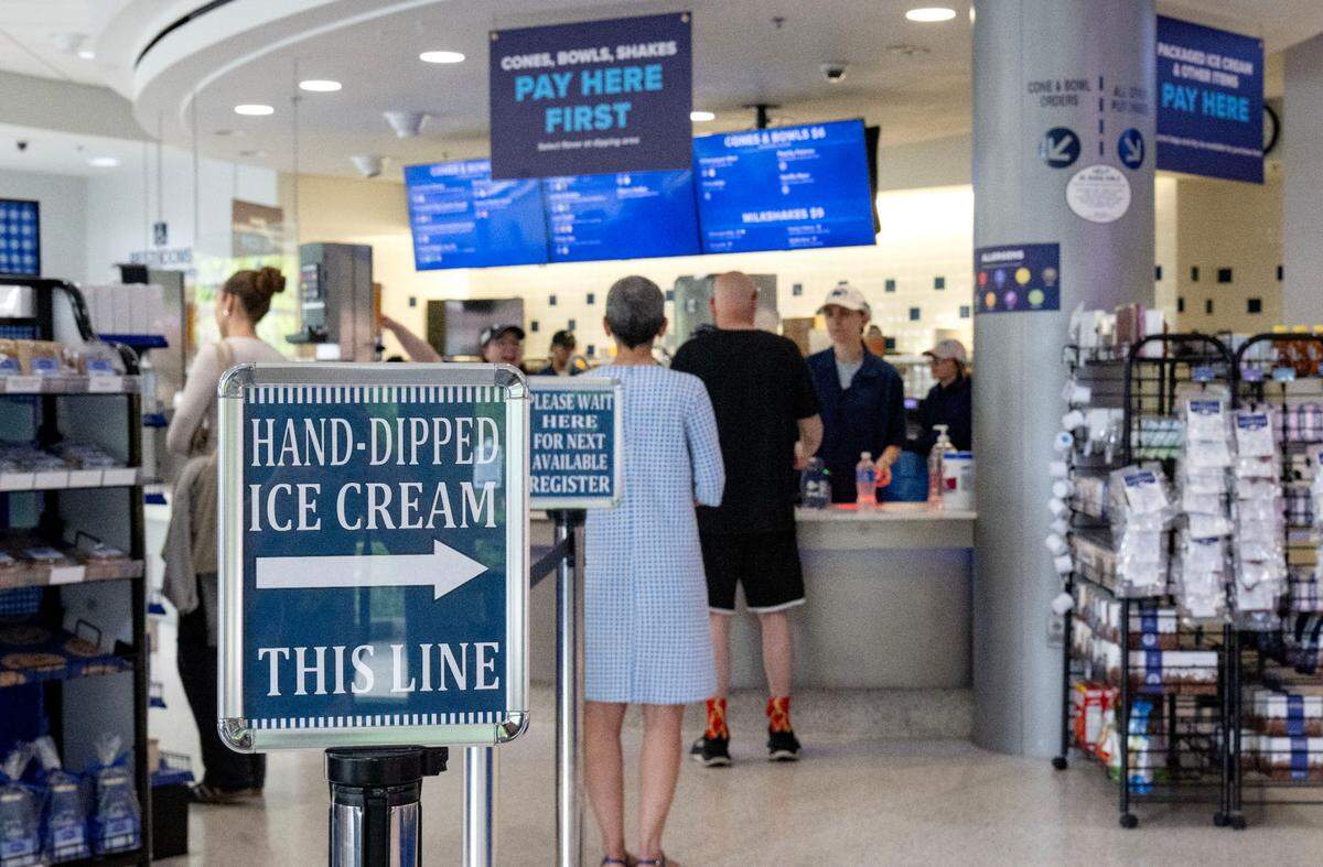 People wait to get hand-dipped ice cream at the Penn State Berkey Creamery on Thursday, May 16, 2024.
