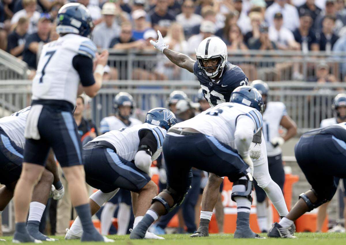 Penn State defensive end Dani Dennis-Sutton motions to teammates during the game against Villanova on Saturday, Sept. 13, 2025.  