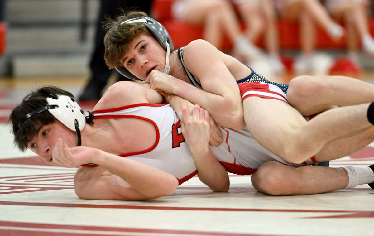 Bald Eagle Area’s Caden Judice controls Bellefonte’s Nolan Weaver in the 121 lb bout of the match on Tuesday, Jan. 23, 2024.