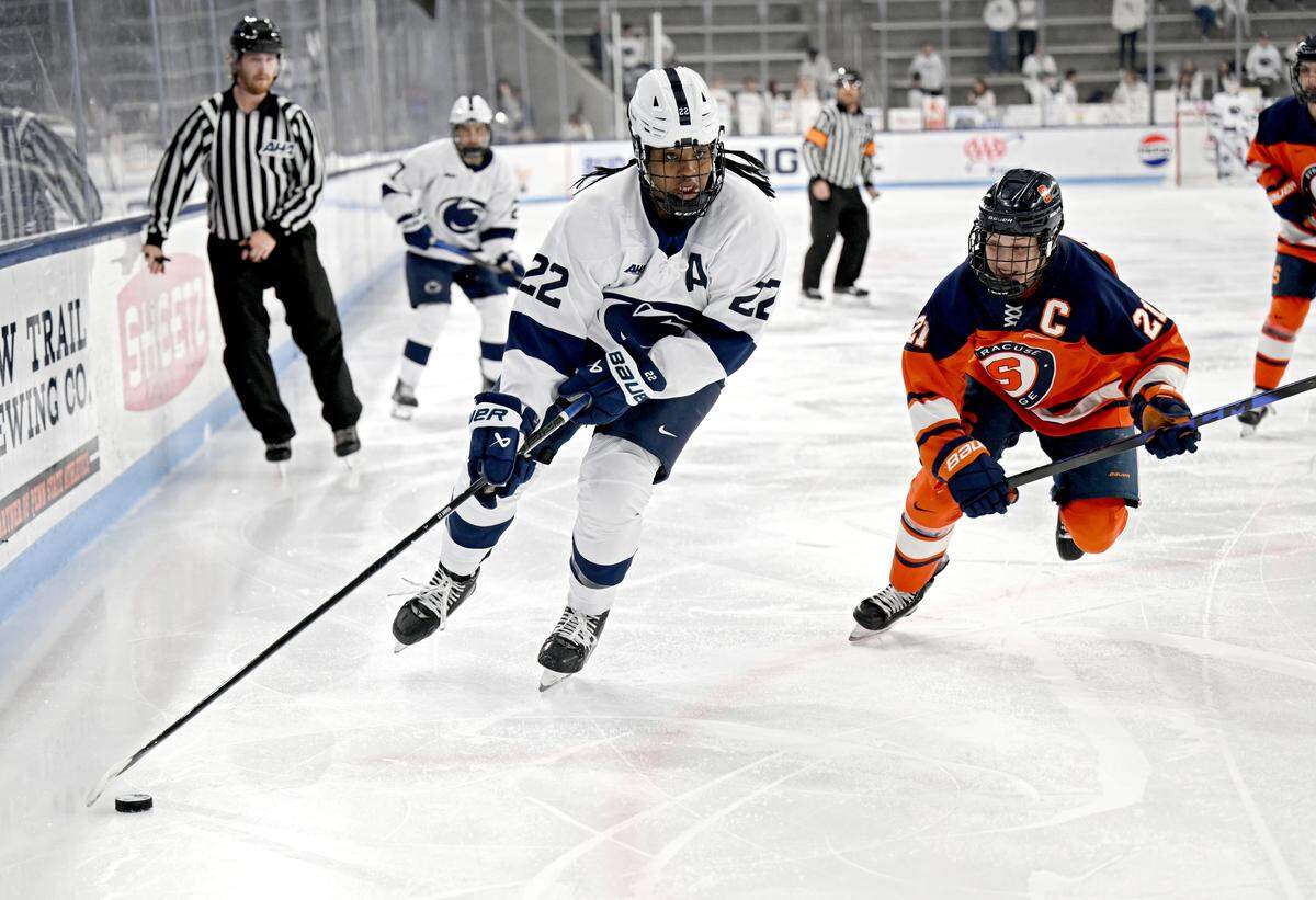 Syracuse defenders can’t stop Penn State’s Katelyn Roberts during the game on Friday, Nov. 14, 2025 at Pegula Ice Arena. Penn State won, 7-0.