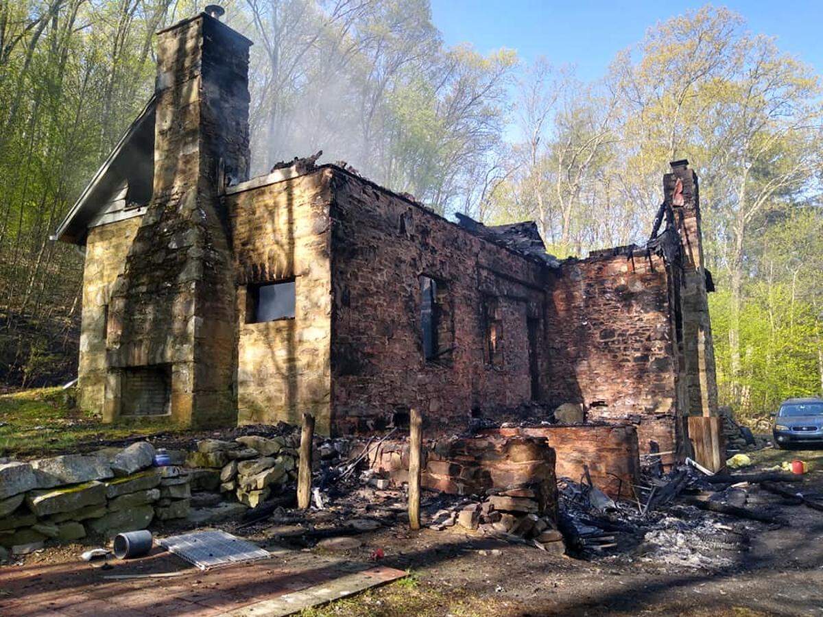 A fire that broke out in the porch area of a house along the 700 block of Mountain Road in Harris Township destroyed a house that three adults were living in.