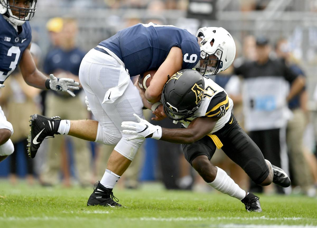 Appalachian State defensive back Tae Hayes can’t stop Penn State quarterback Trace McSorley as he runs into the end zone for the first touchdown of the game Saturday, Sept. 1, 2018 at Beaver Stadium.