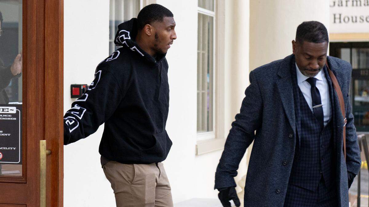 Kaveion Keys, 19, of Virginia, leaves the Centre County Courthouse with defense lawyer Michael Walker on Wednesday, Dec. 11, 2024.