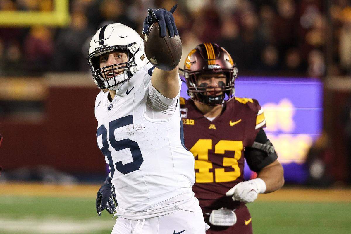 Nov 23, 2024; Minneapolis, Minnesota, USA; Penn State Nittany Lions tight end Luke Reynolds (85) celebrates after converting a fake punt against the Minnesota Golden Gophers during the fourth quarter at Huntington Bank Stadium. Mandatory Credit: Matt Krohn-Imagn Images