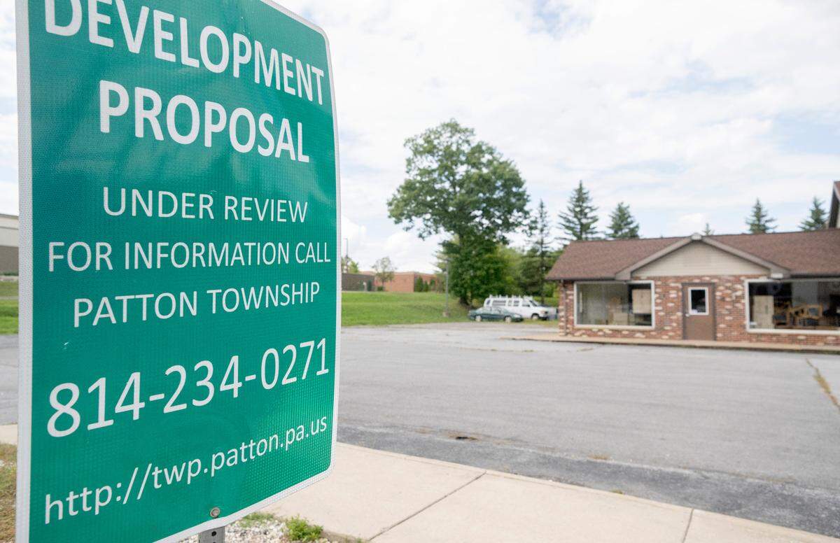A development proposal sign at 1869 North Atherton Street on Monday, Sept. 12, 2022.