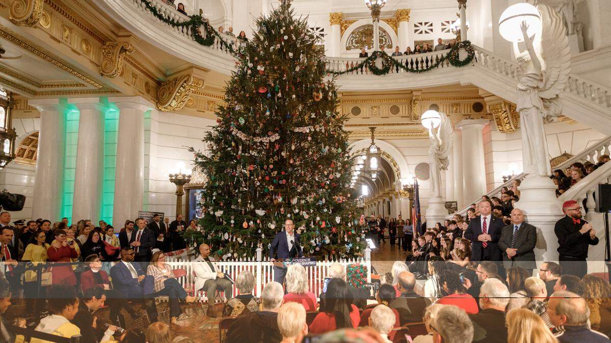 Gov. Josh Shapiro speaks during the 2025 Capitol Christmas tree lighting ceremony.