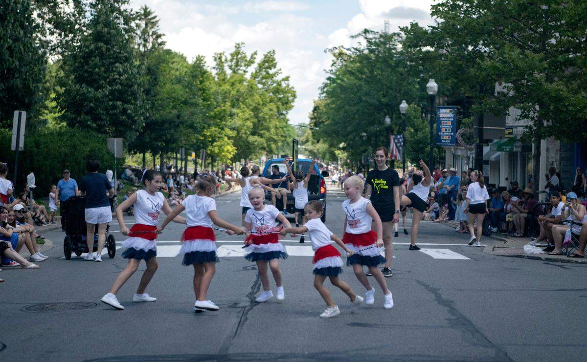 M Twirling Team performs as they march along College Avenue for the Central PA 4th Fest Parade on Tuesday, July 4, 2023.