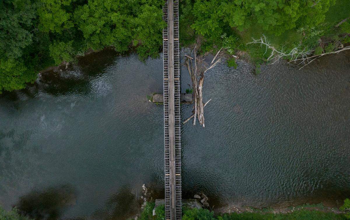 The foot bridge that goes over Penns Creek off of Tunnel Road in Coburn, often referred to as Fisherman’s Path, is in need of repairs. On Thursday, June 9, 2022 members of the Department of Conservation and Natural Resources met at the bridge to talk about financial needs.