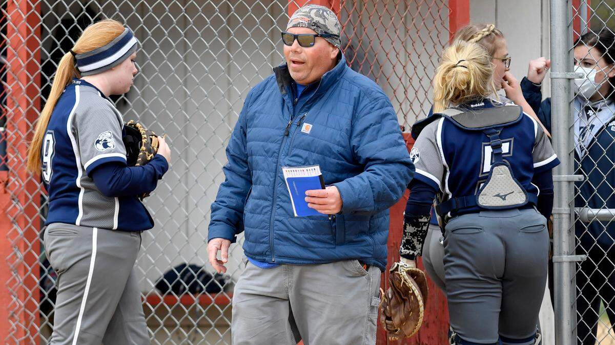 Philipsburg-Osceola softball coach Steve Frank talks to his players as they come off the field during the game against Bellefonte on Friday, April 16, 2021.