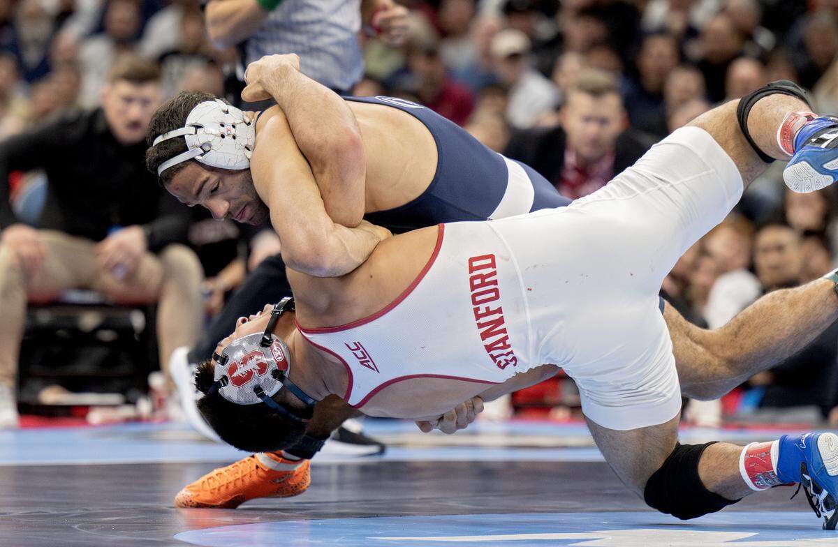 Penn State's Shayne Van Ness controls Stanford's Aden Valencia in the 149-pound championship bout at the NCAA wrestling championships on Saturday, March 21, 2026.